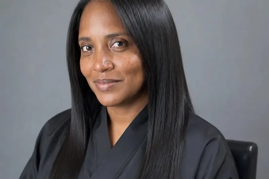 Smooth, glossy black hair after a keratin treatment